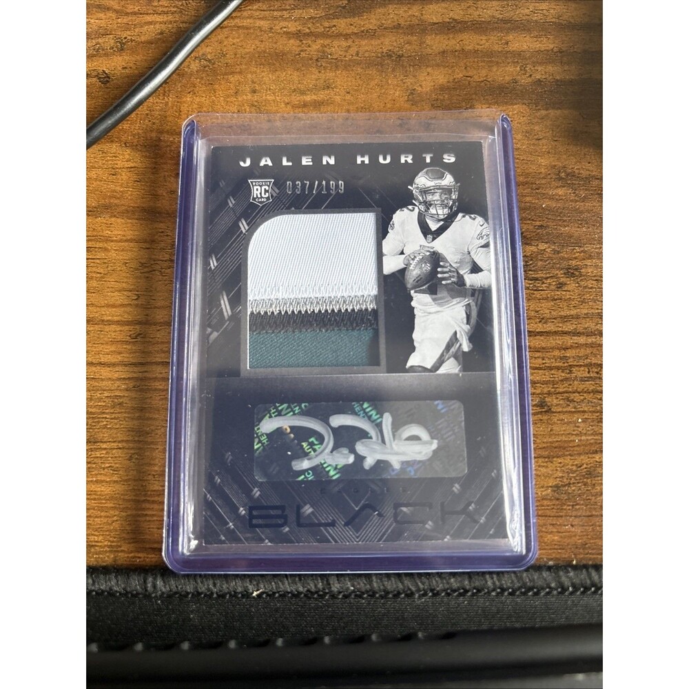 2020 Panini Black - Rookie Patch Autographs Jalen Hurts #207 /199 (AU, MEM, RC)